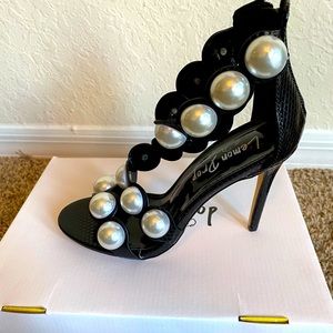Large pearl studded heels
